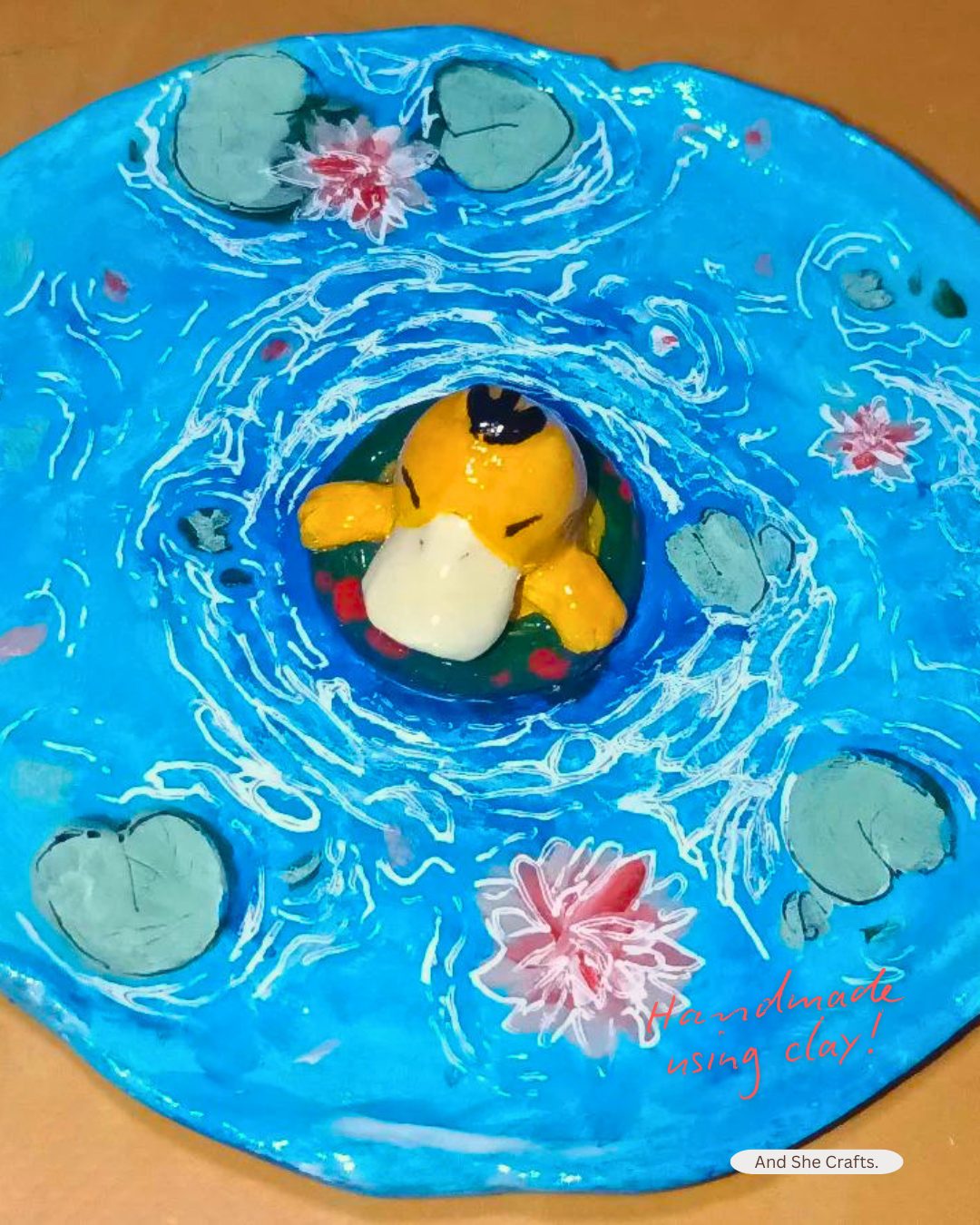 A clay art piece crafted by And She Crafts